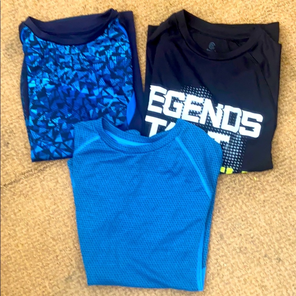 Three Champion shirts
